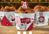 With the holidays just around the corner, Kentucky Fried Chicken® is serving up extra joy this season with a new holiday bucket design and matching holiday merch collection. The famous fried-chicken chain is also serving up two new menu items to make holiday celebrations Extra Crispy™. (PRNewsfoto/Kentucky Fried Chicken)