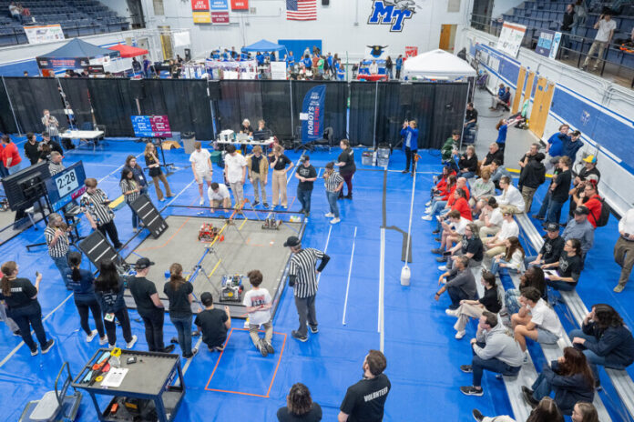 High school teams compete on campus in a robotic battle.