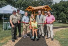 L-R: Henry Horton State Park Manager Shaun Rainone, Tennessee State Parks Area Manager Jacob Young, Sen. Joey Hensley, Amy Harris, Said Harris, TDEC Deputy Commissioner Greer Tidwell, Tennessee State Parks Director of Operations Kim Moore, and Rep. Todd Warner.