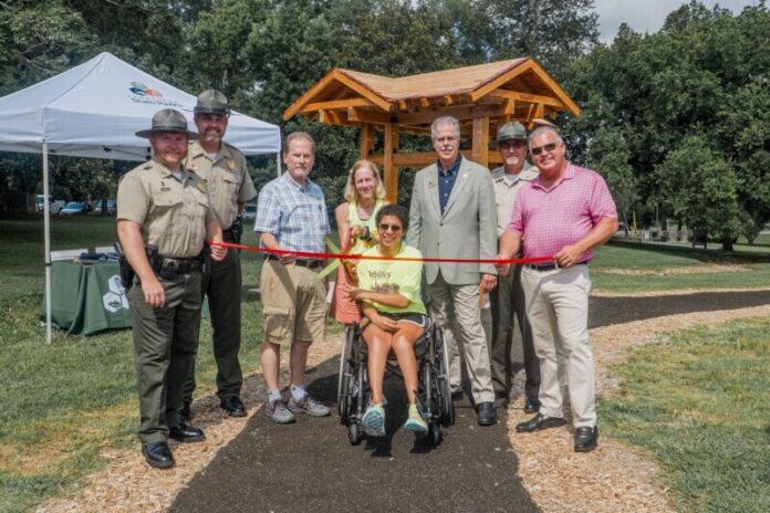 Henry-Horton-Park-3-1 L-R: Henry Horton State Park Manager Shaun Rainone, Tennessee State Parks Area Manager Jacob Young, Sen. Joey Hensley, Amy Harris, Said Harris, TDEC Deputy Commissioner Greer Tidwell, Tennessee State Parks Director of Operations Kim Moore, and Rep. Todd Warner.
